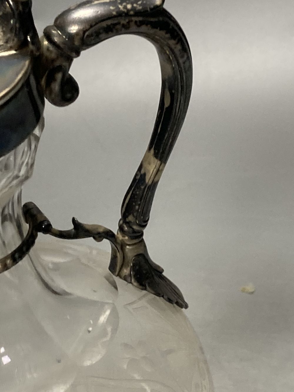 A Victorian silver mounted etched glass claret jug, of bulbous form, Richards & Brown, London, 1869, 25.7cm.